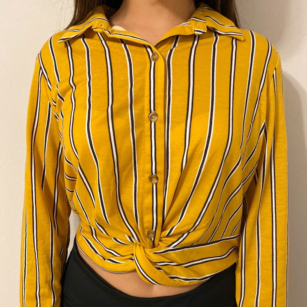 Yellow top with black and white stripes